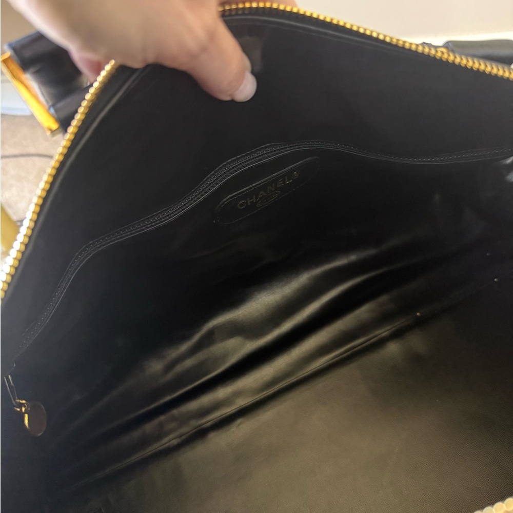 CHANEL Black Quilted Leather Travel Weekender with Gold Logo Charm - Picture 7 of 13